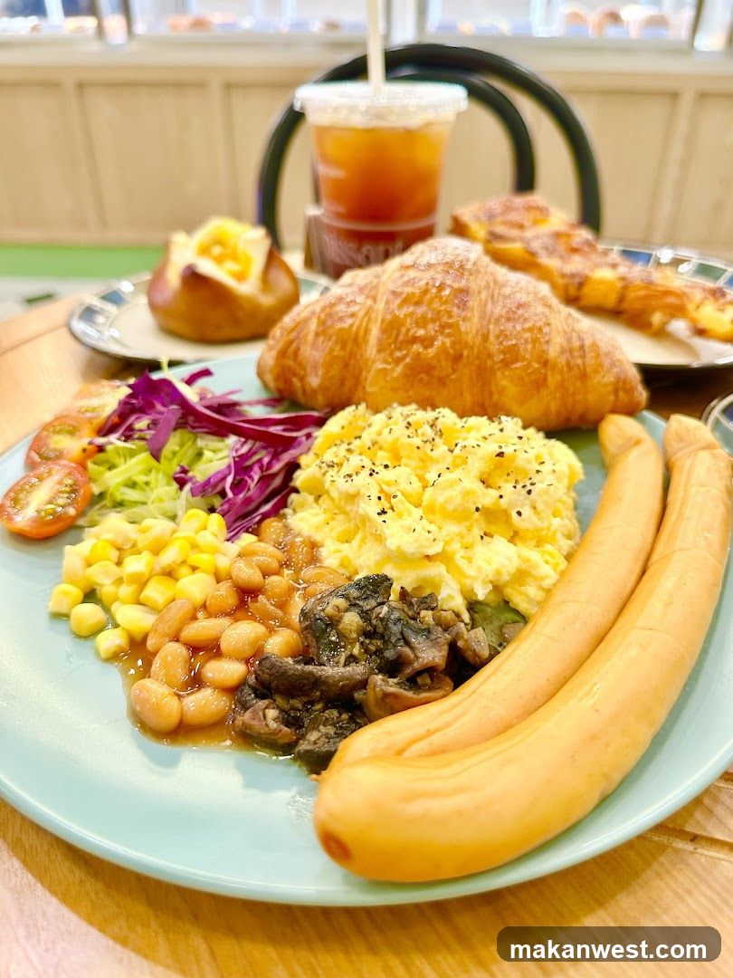 Breakfast Plate with Croissant and Sausages