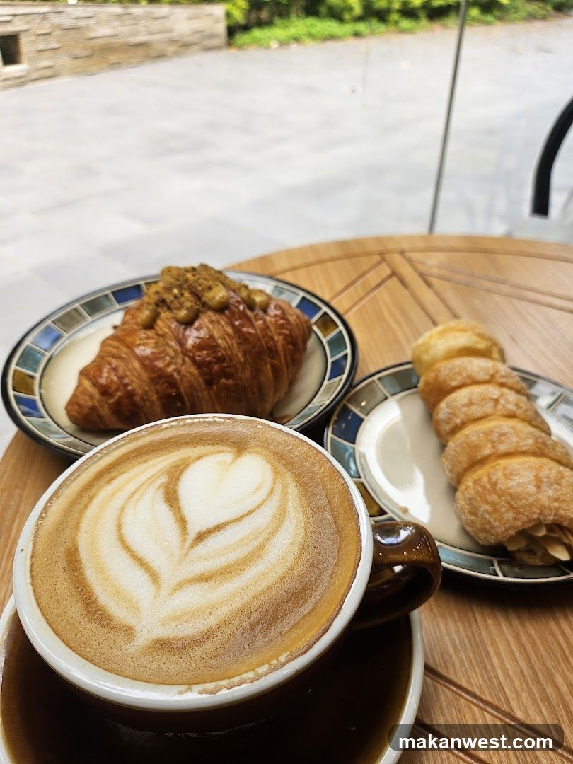 Coffee and Pastries on a Wooden Table