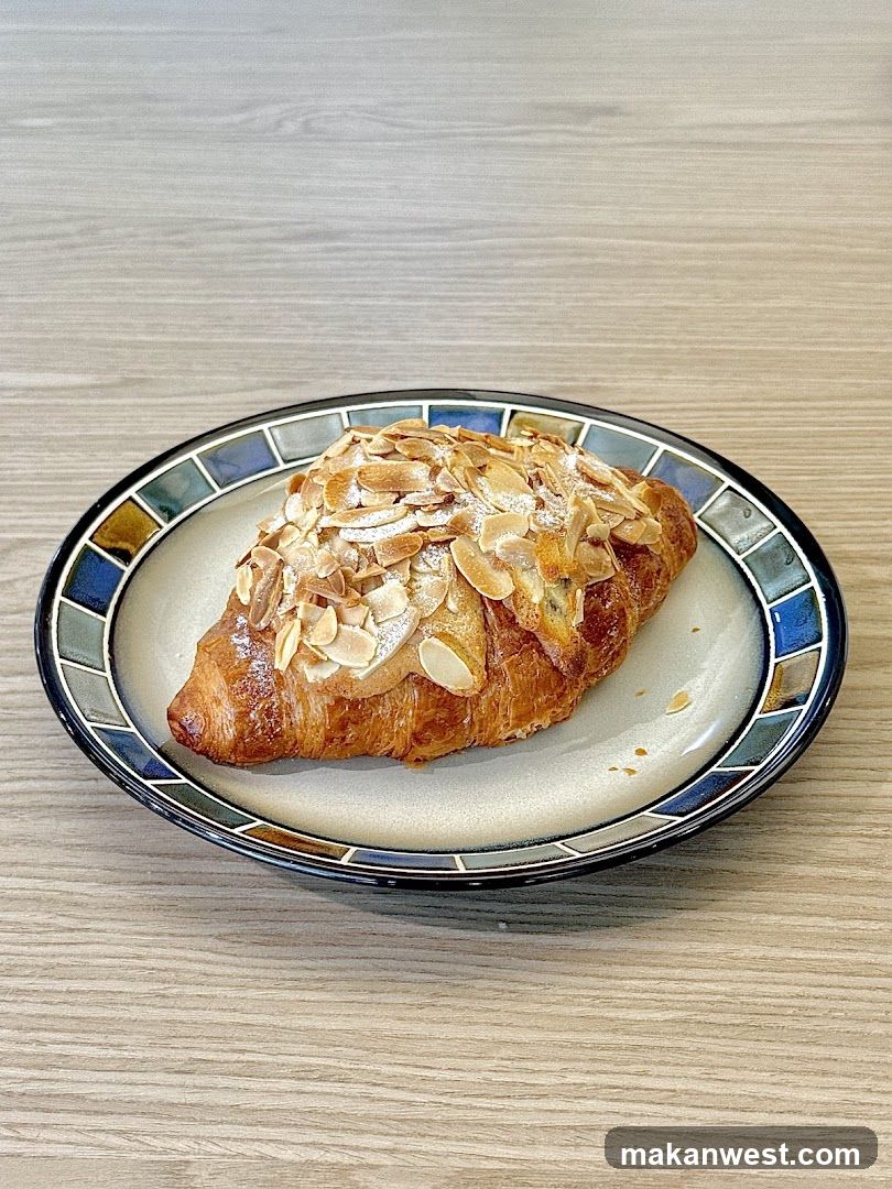 Almond Croissant on a Decorative Plate