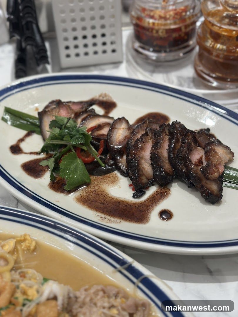 Sliced Roasted Meat with Sauce and Garnish