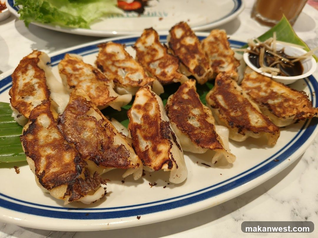 Pan-fried Dumplings with Soy Sauce