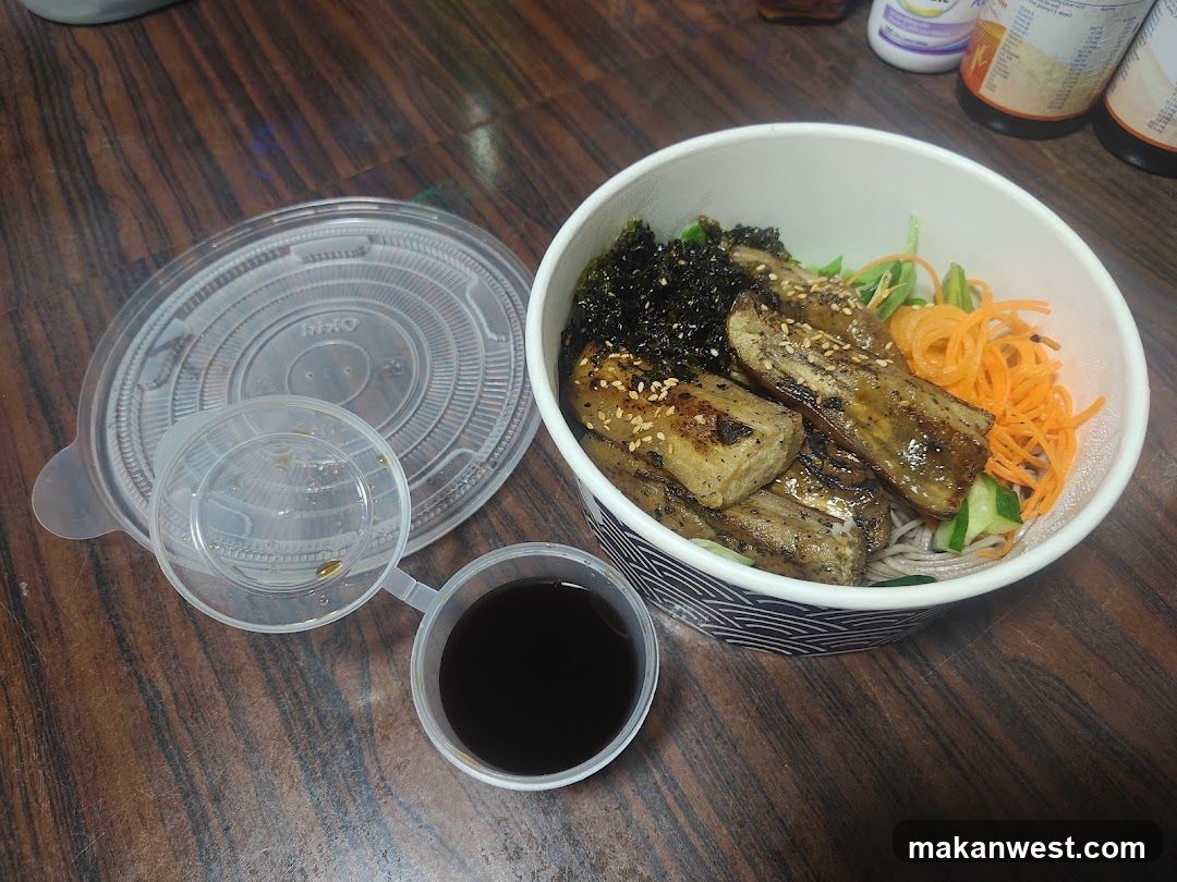 Bowl of food with sides