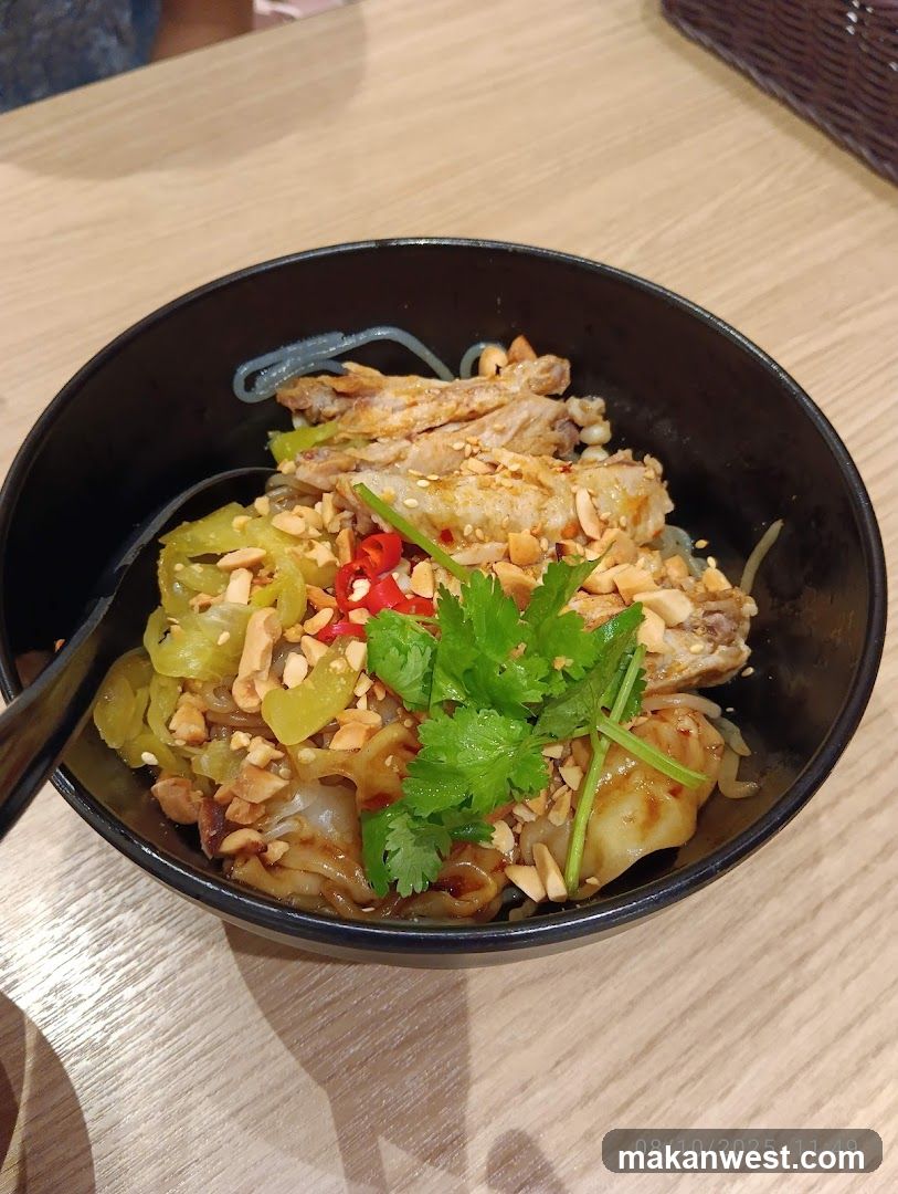 Bowl of Chicken Noodles with Garnish
