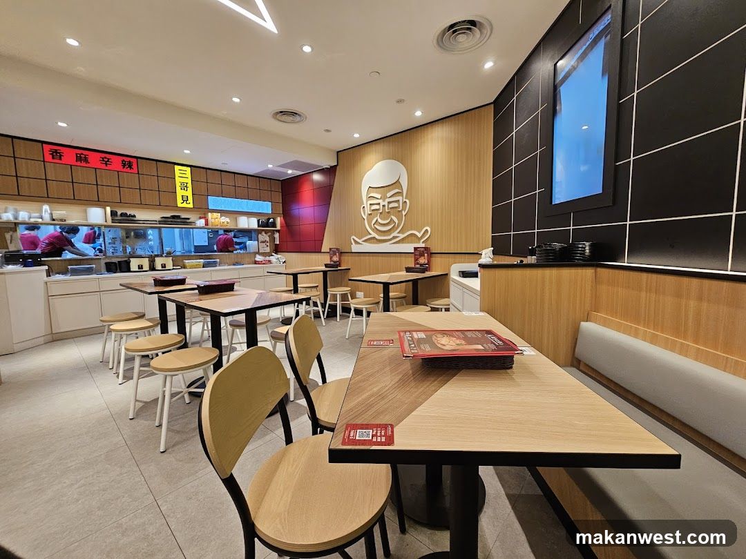 Restaurant Interior with Tables and Kitchen View
