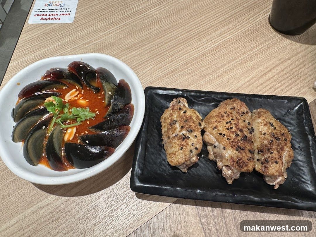Food on table with egg and chicken wings