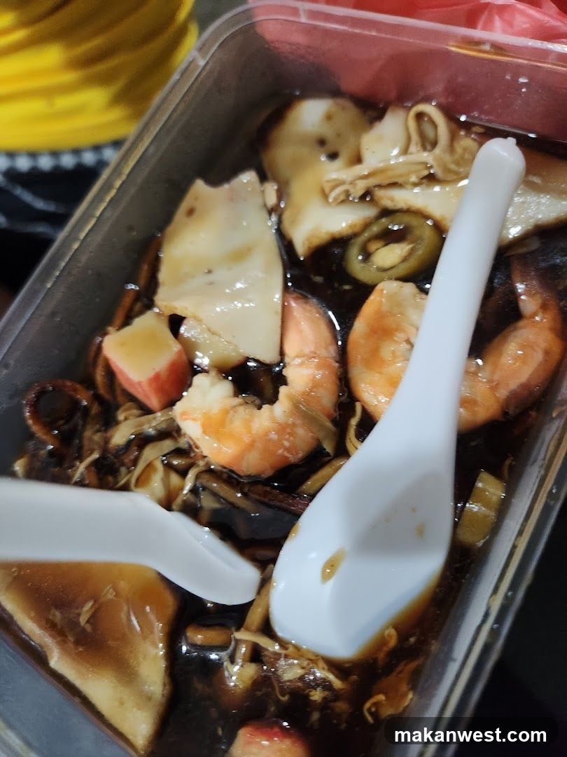 Takeout Container of Seafood and Mushroom Dish