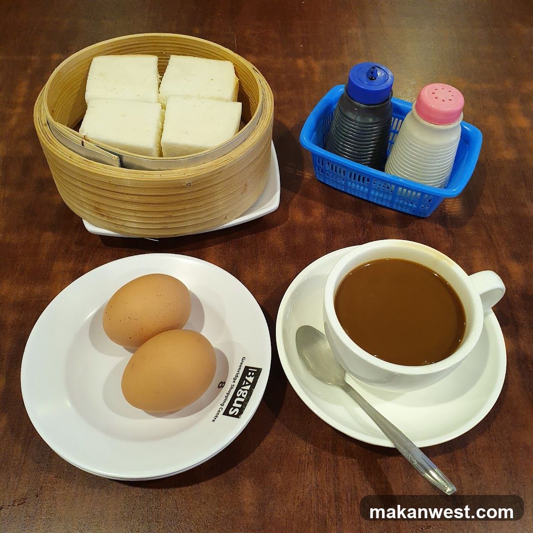Breakfast Meal with Steamed Buns, Eggs and Coffee