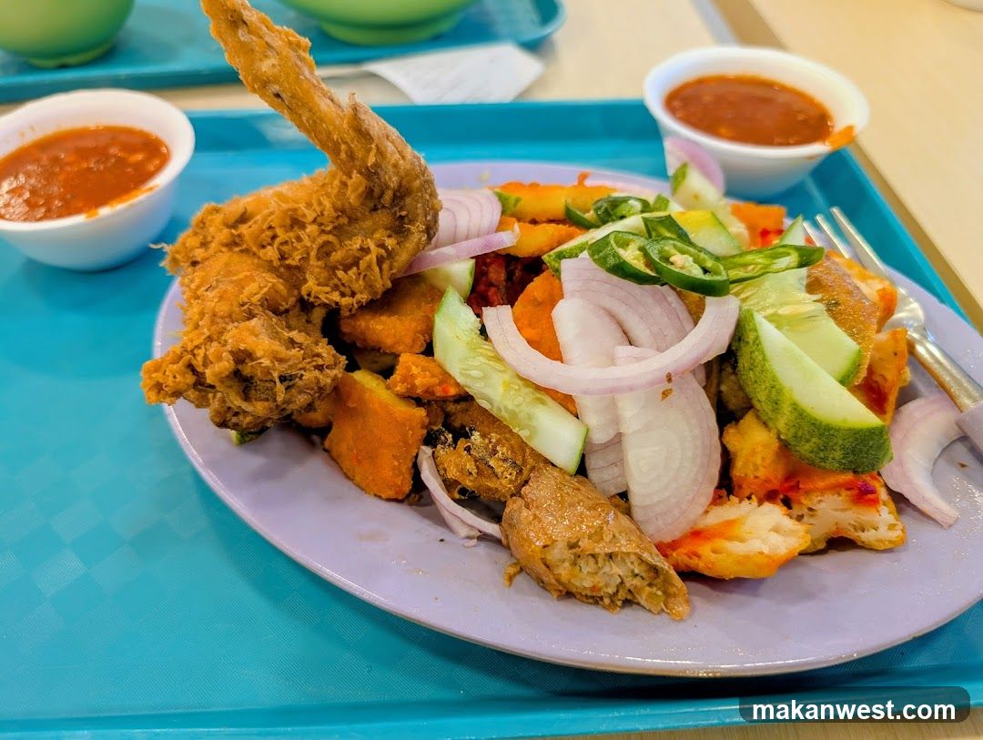 Fried Chicken and Rice Dish with Sauces