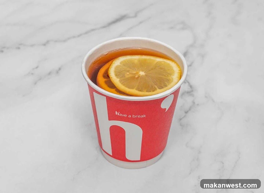 lemon tea in branded cup