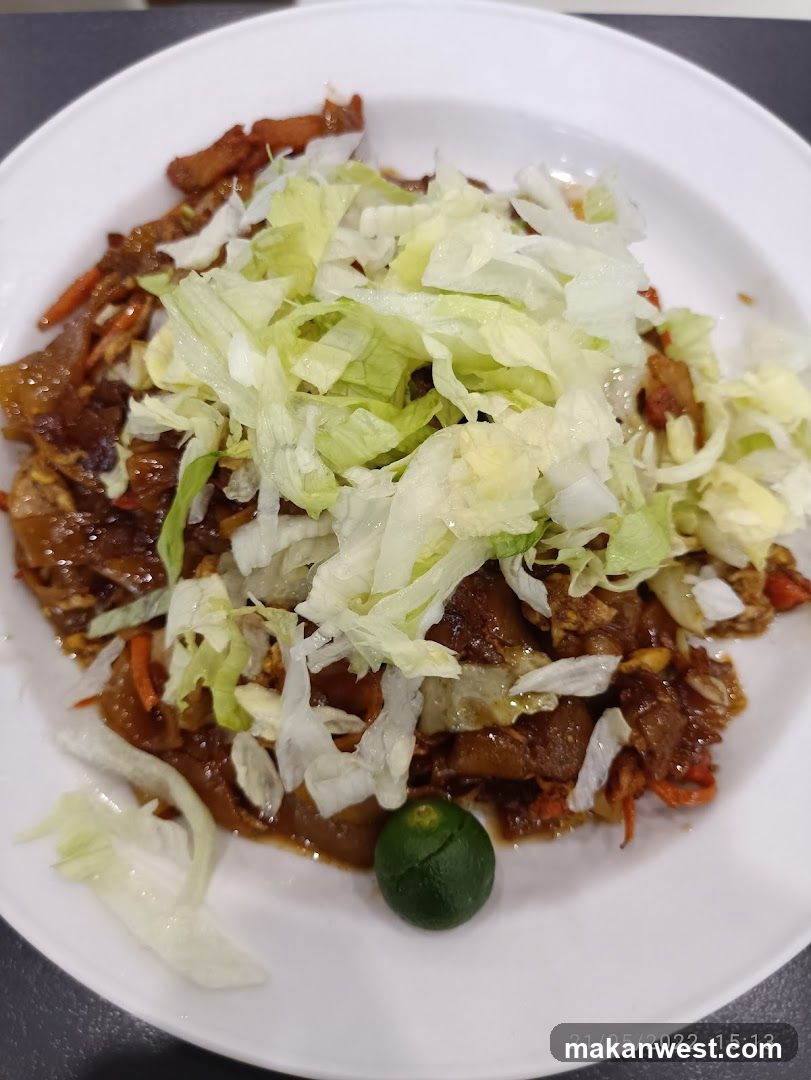Plate of Stir-fried Noodles with Lettuce