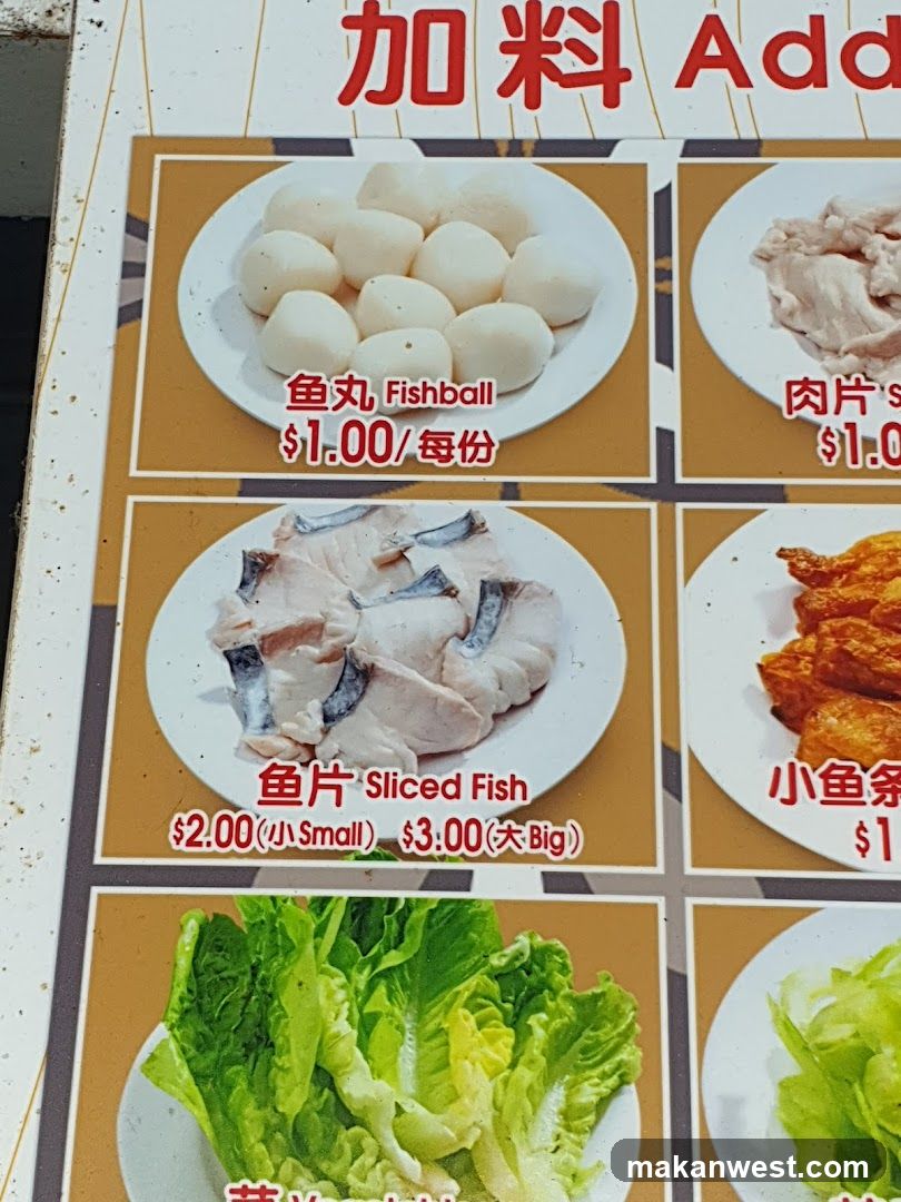 A close-up of a menu board displaying various food items with prices in Chinese and English.