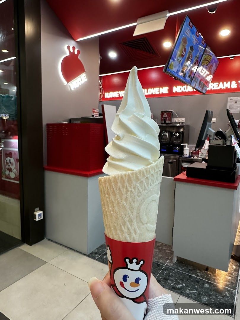 Soft-serve ice cream cone in store