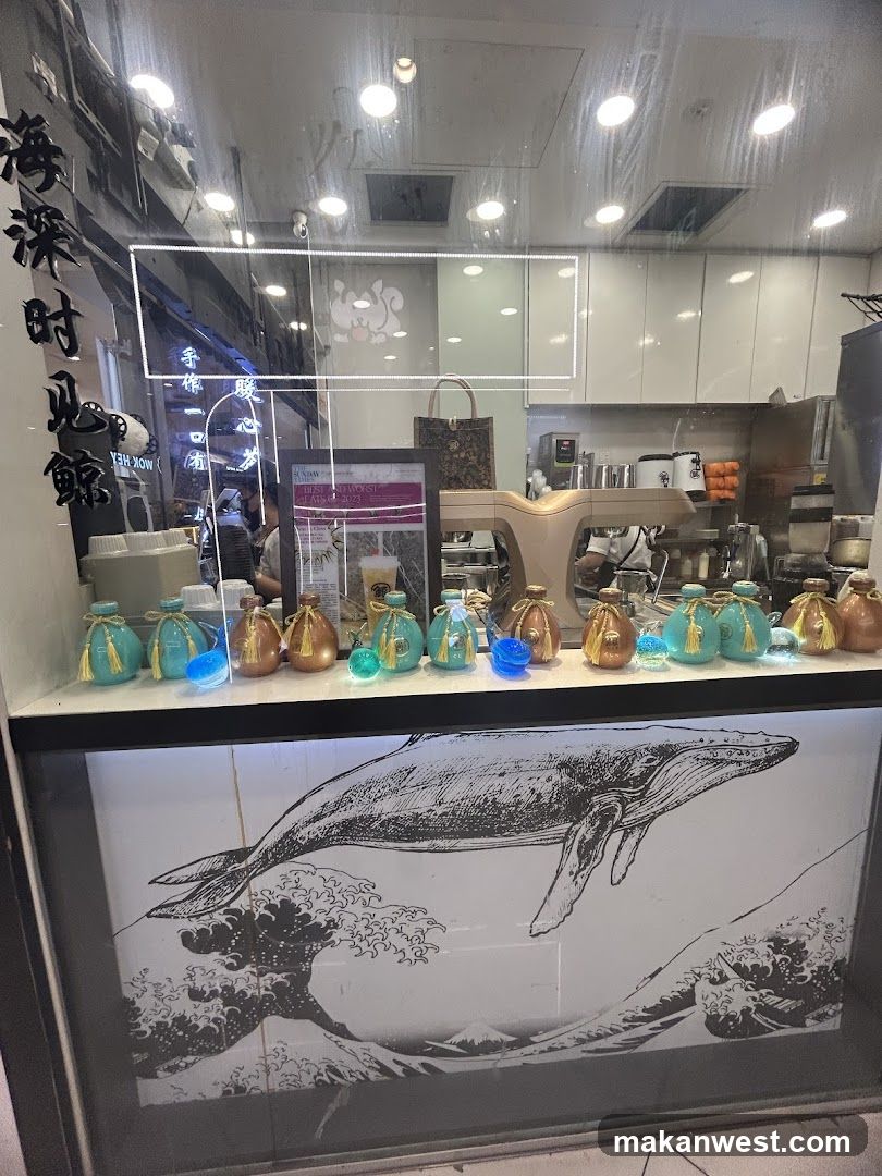 Storefront Interior View with Decorative Bottles and Whale Illustration