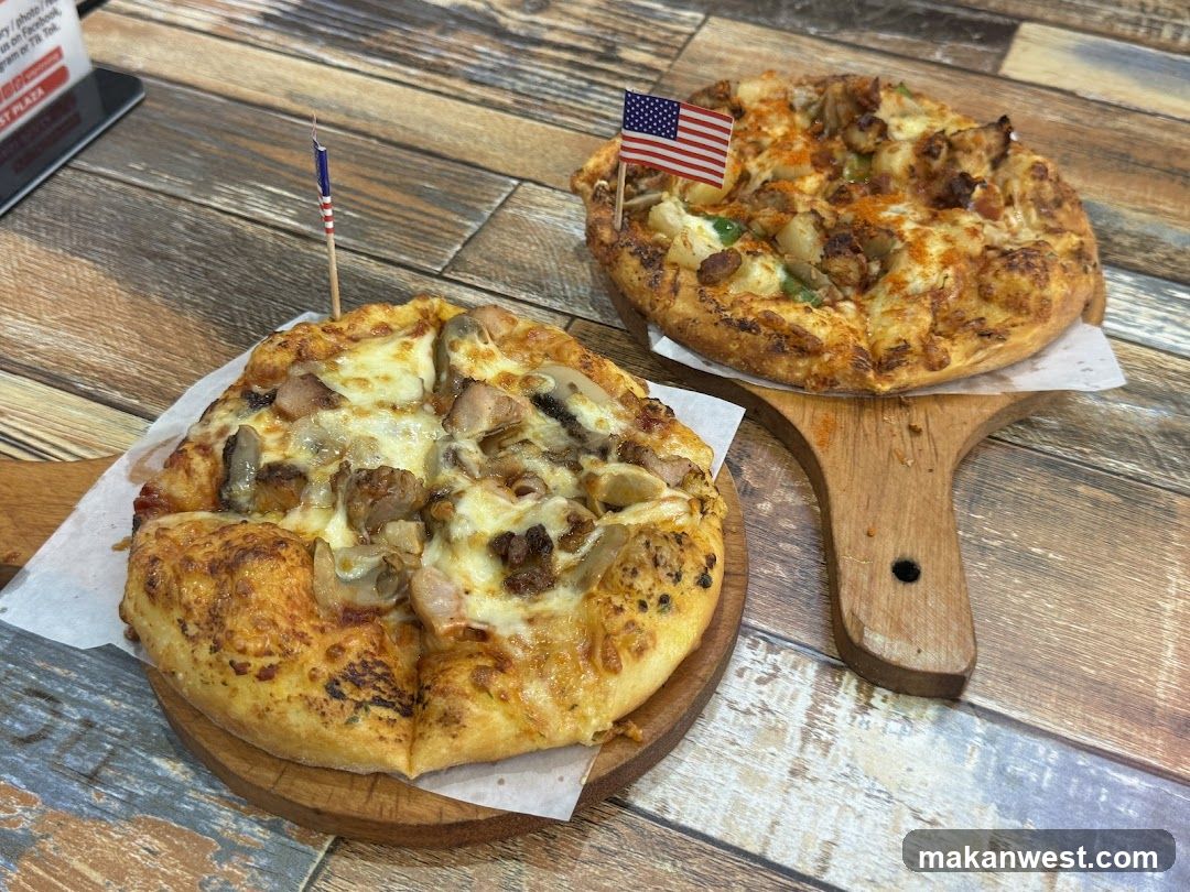 Two Pizzas on Wooden Boards