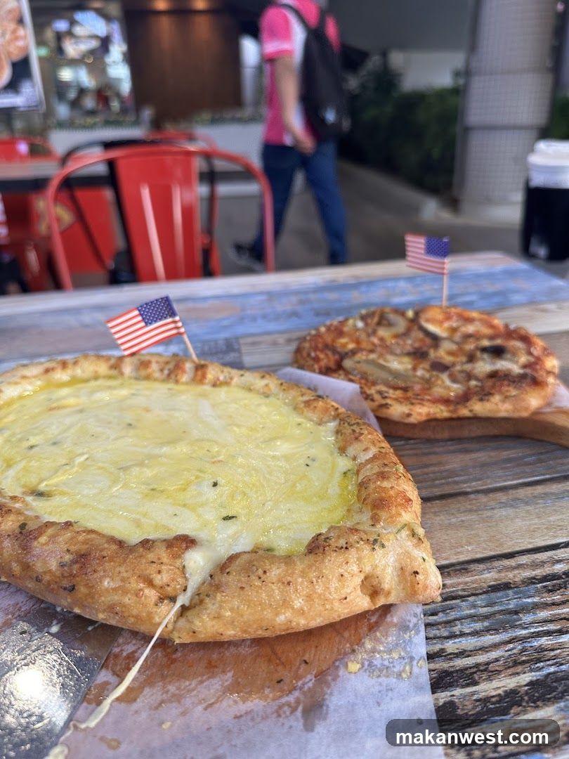 Pizza on wooden table with American flags