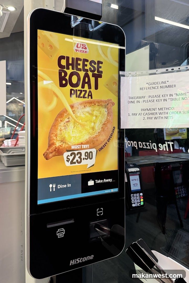 Self-order kiosk at pizza shop