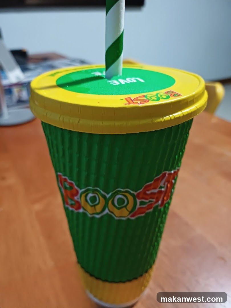 Booster Cup with Green and Yellow Design