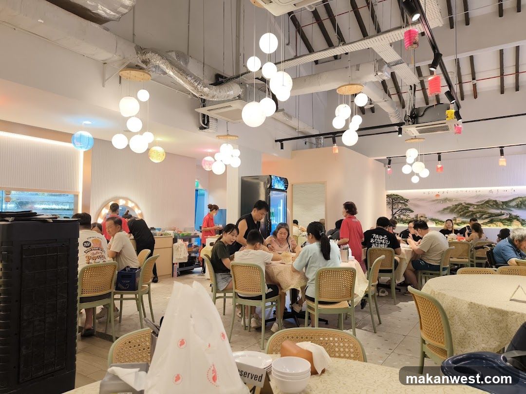 Dining Interior with Hanging Lights and Patrons