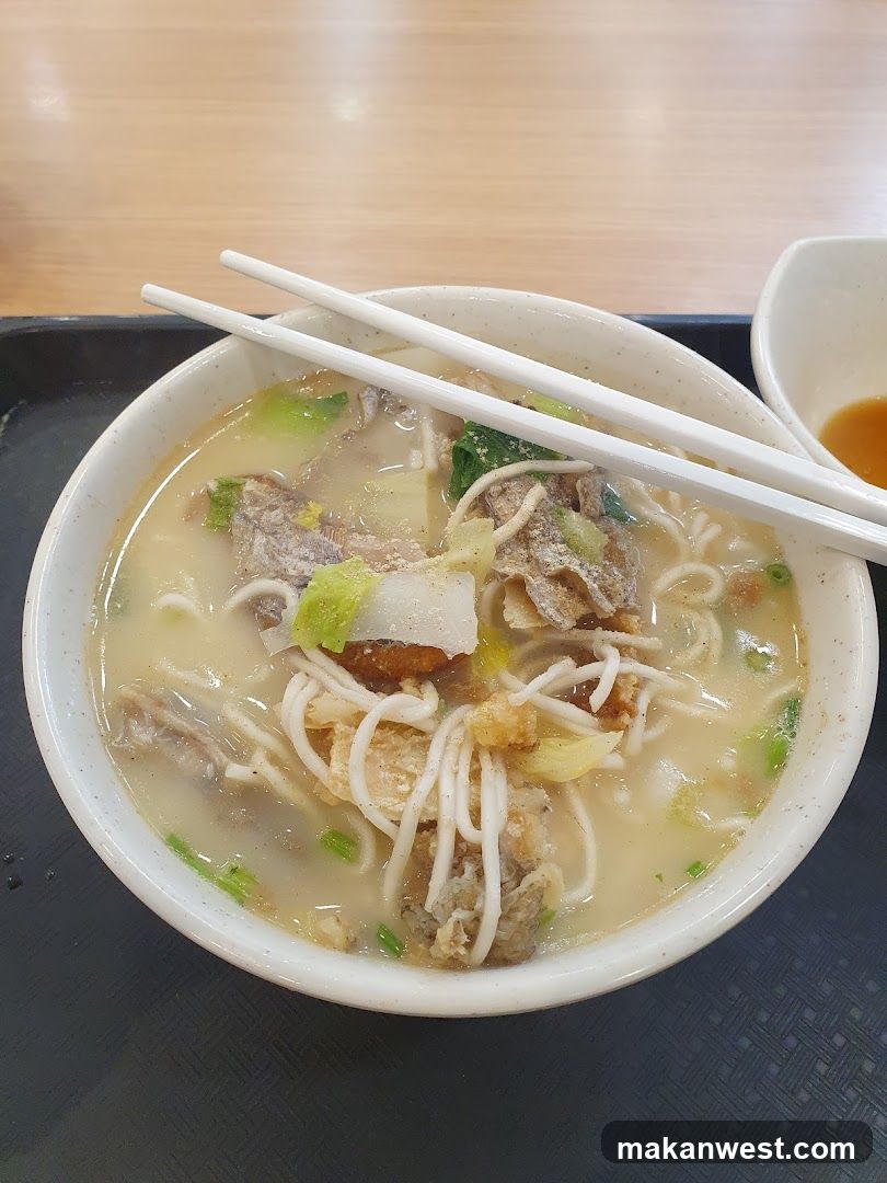 Bowl of Noodle Soup with Chopsticks