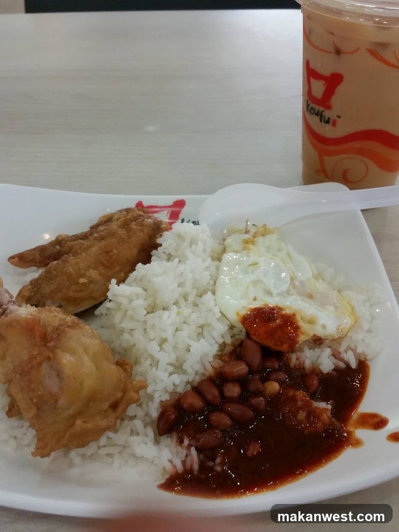 Fried Chicken Rice Plate with Beans and Egg