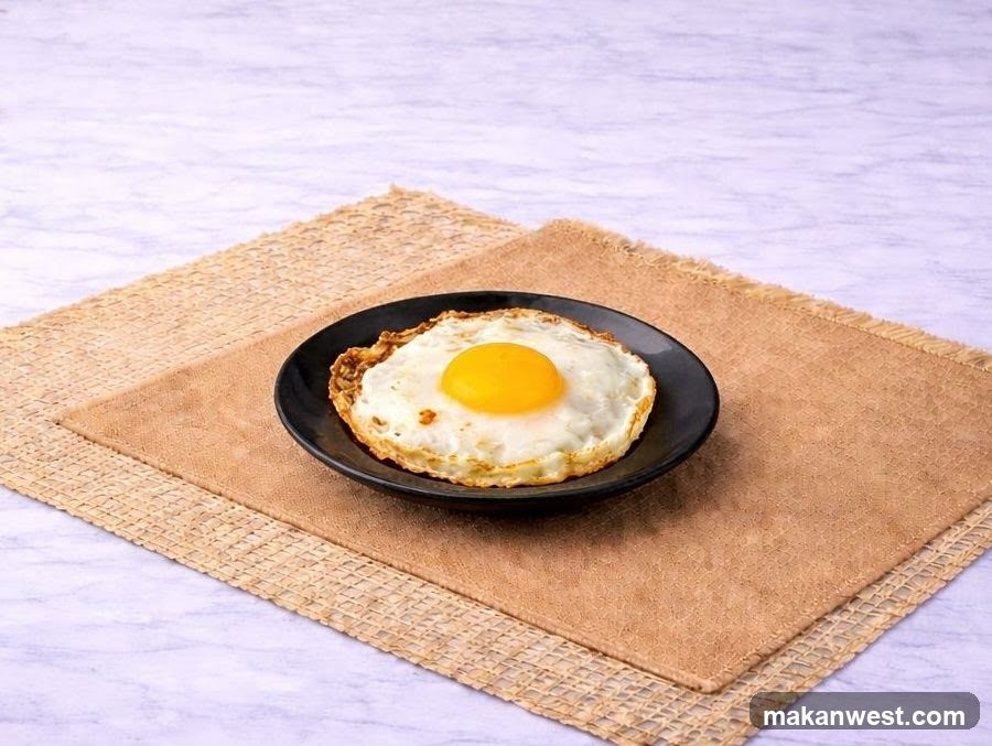 Fried Egg on Black Plate