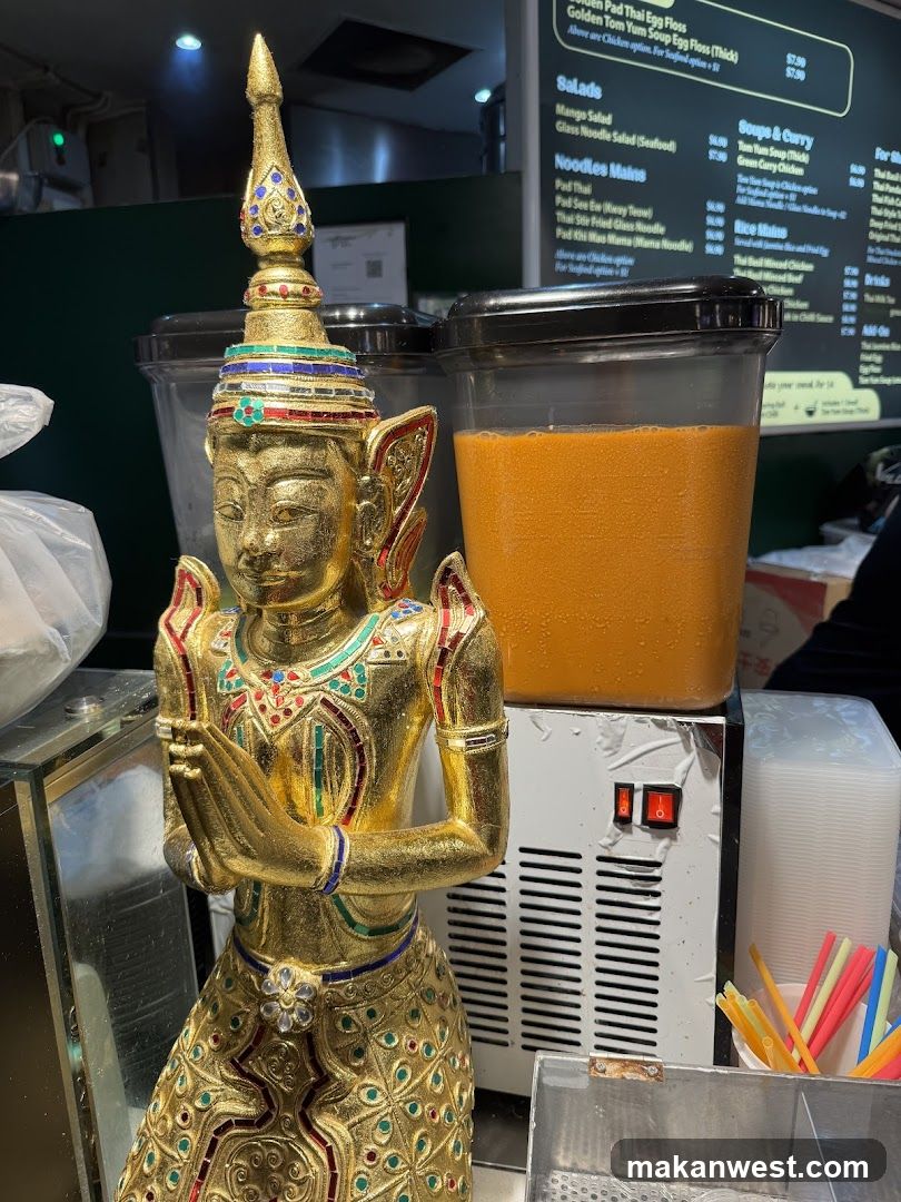 Thai Statue and Menu Board