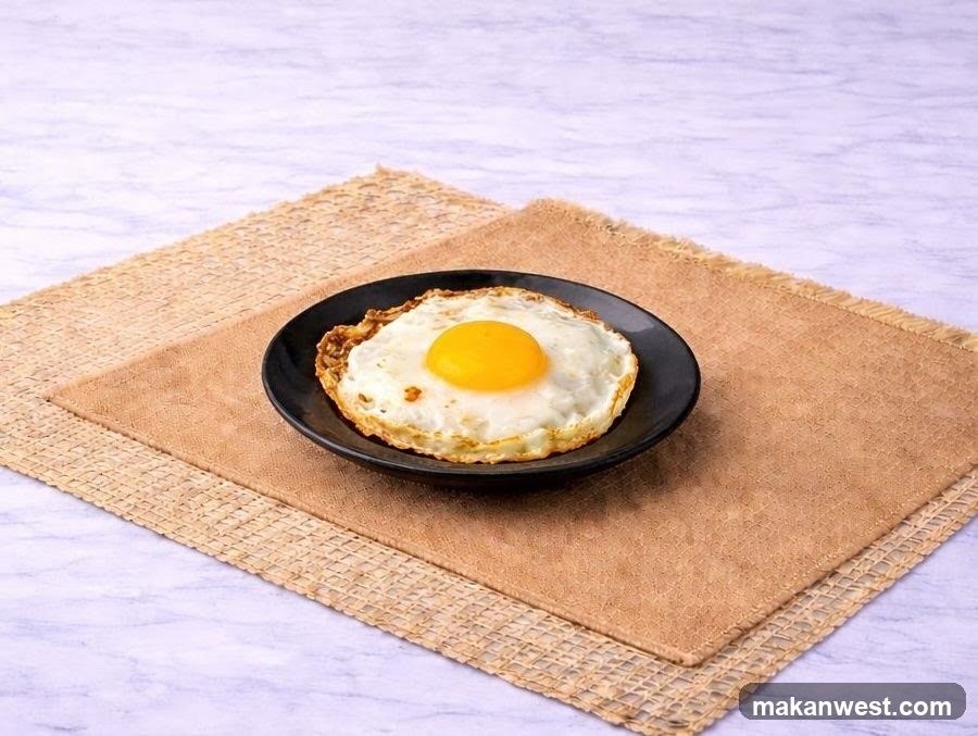Fried Egg on Black Plate