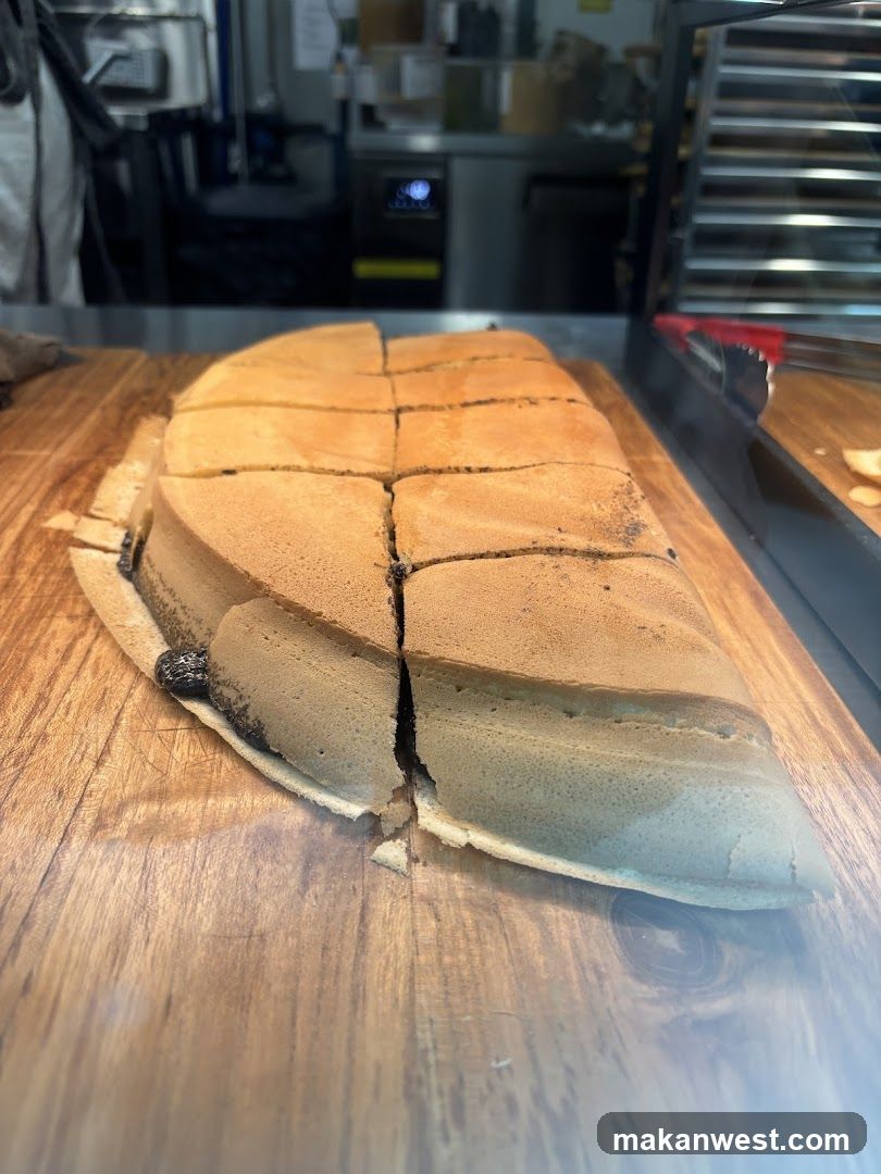 Sliced Cake on Wooden Board