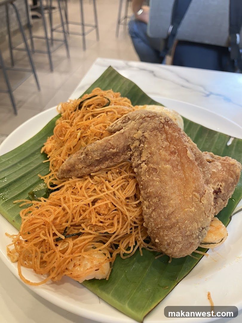 Fried Chicken and Noodles on Banana Leaf