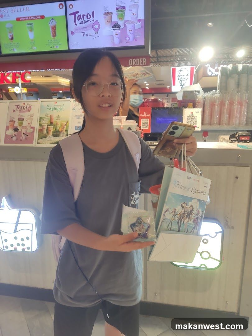 Customer with Tarō drinks and merchandise