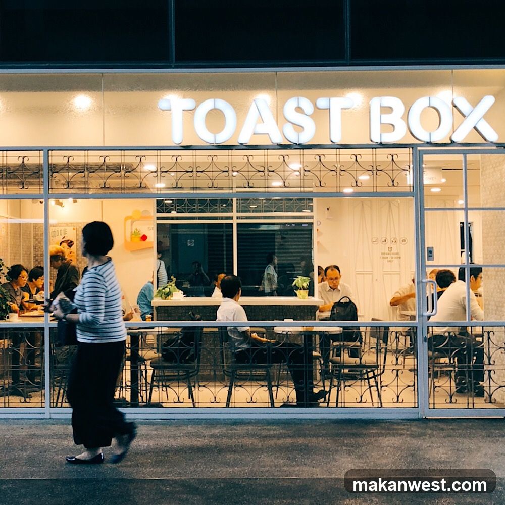 TOAST BOX storefront at night