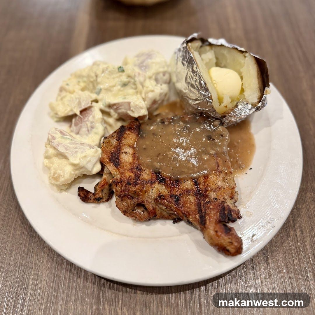 Grilled Pork Chop with Gravy, Mashed Potatoes and Baked Potato