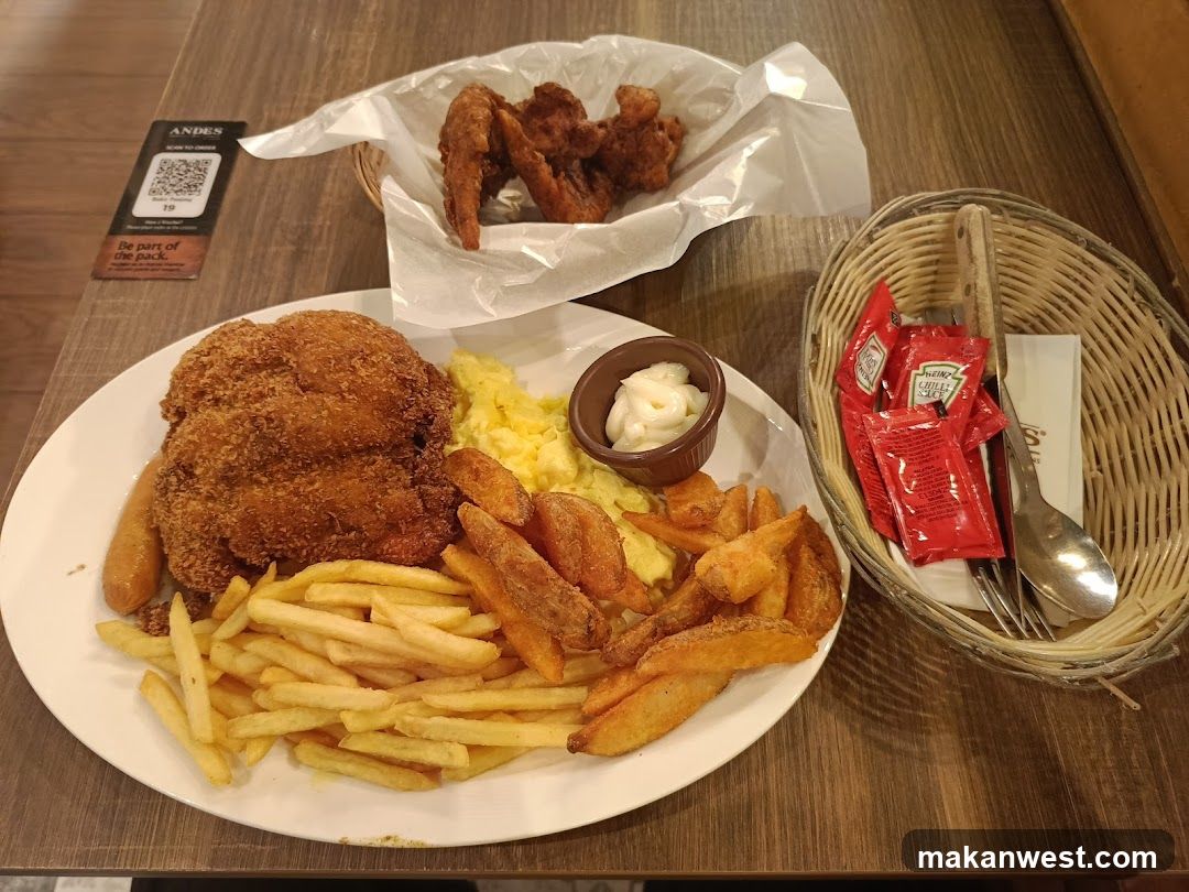 Fried Chicken Meal with Sides and Condiments