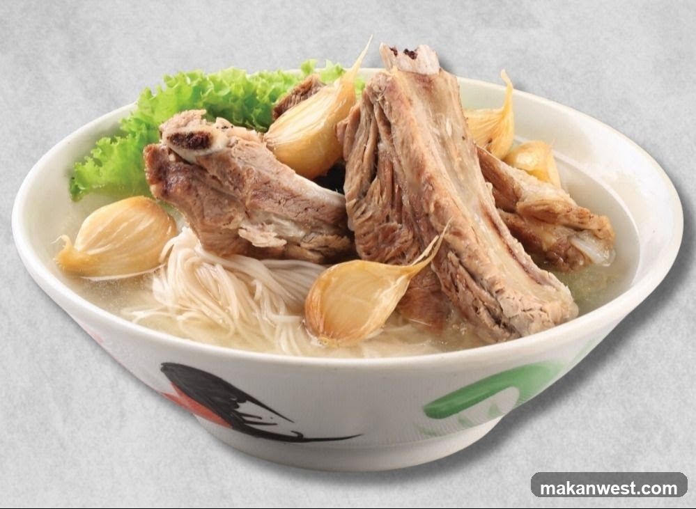 Bowl of Noodle Soup with Meat and Garlic