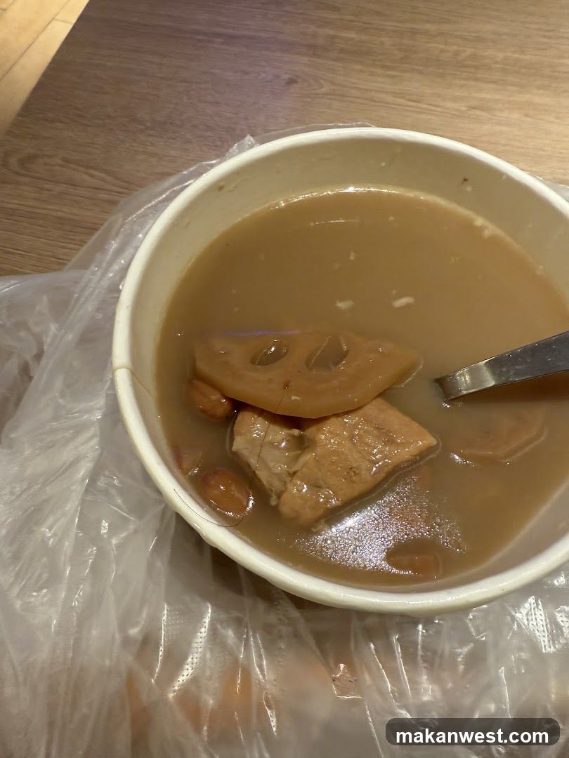 Bowl of Lotus Root Soup with Tofu and Peanuts