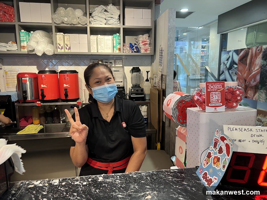 Staff at a beverage shop counter
