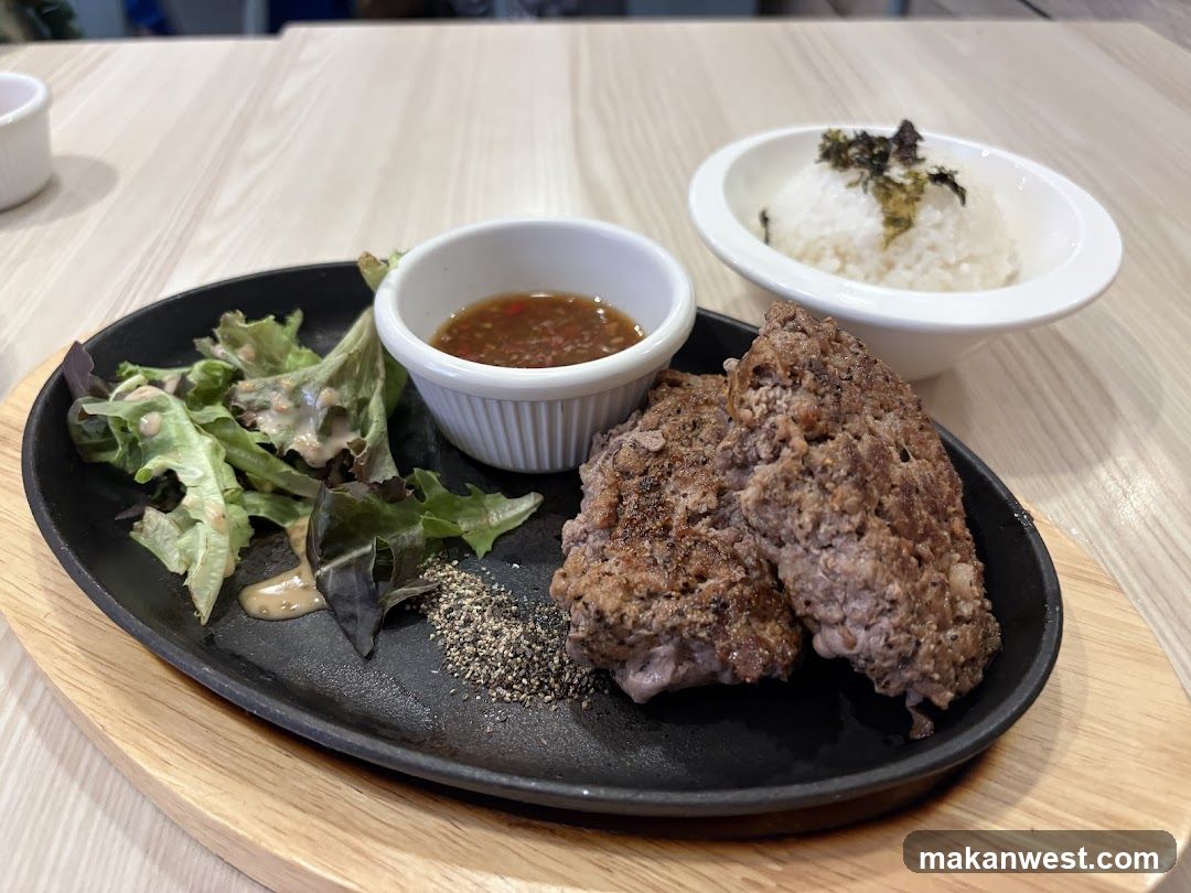 Crispy Meat Dish with Rice and Salad