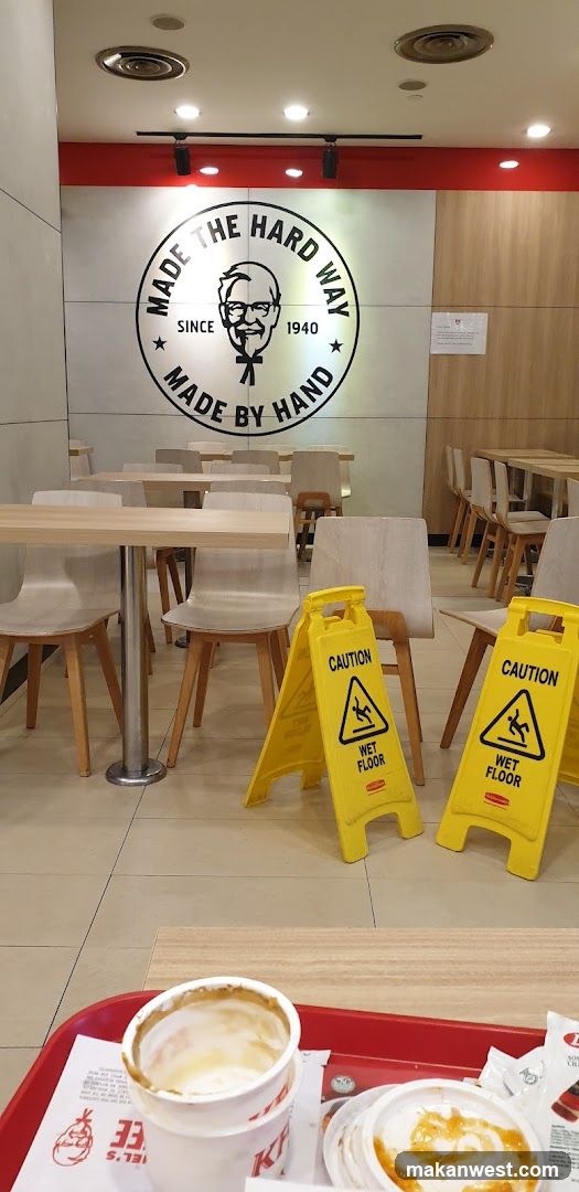 KFC Interior with Wet Floor Signs