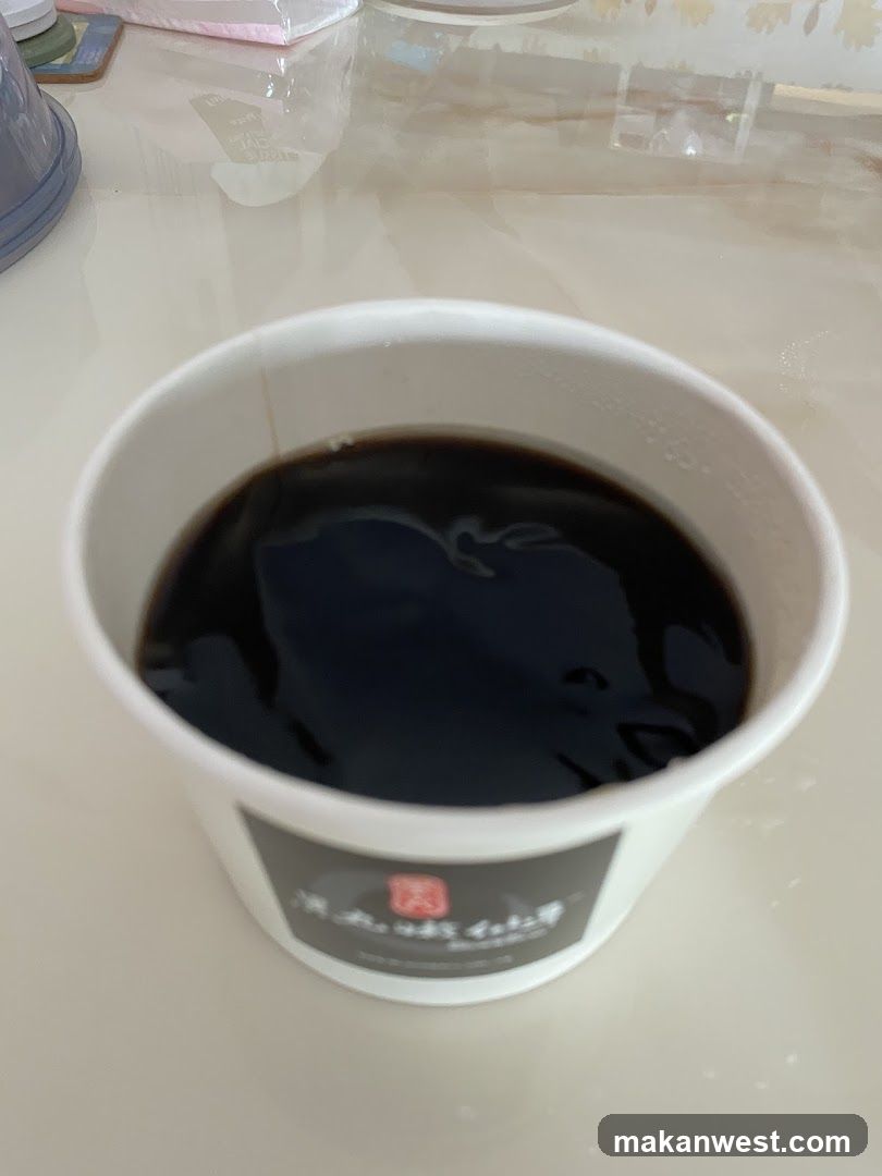 Bowl of Dark Liquid in Cup