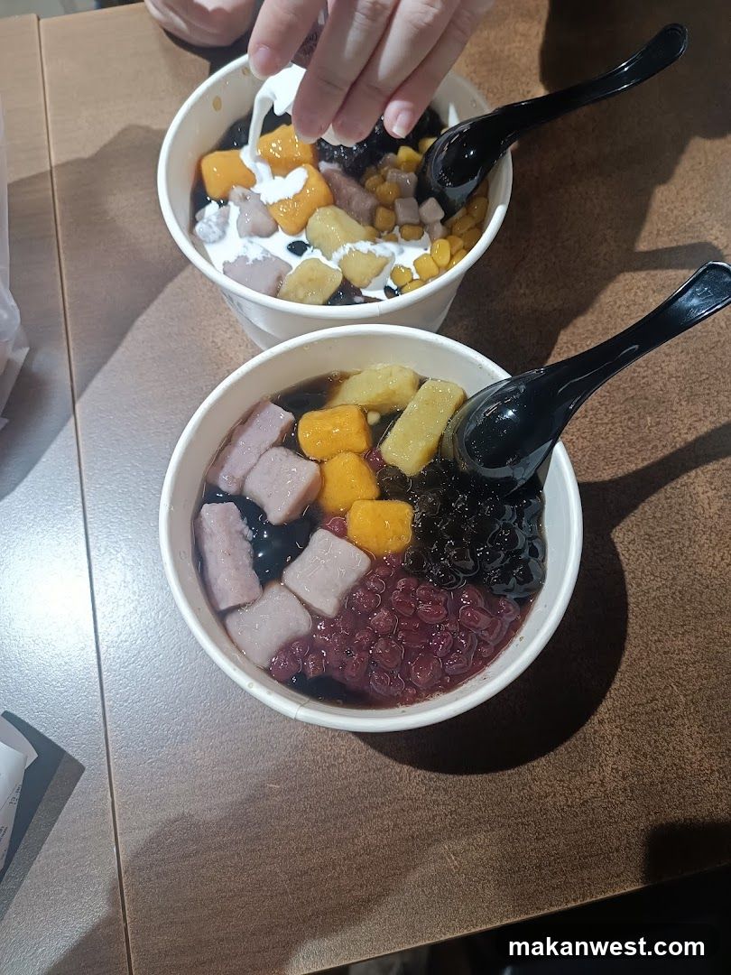 Bowl of Taro Dessert with Mango and Coconut Milk
