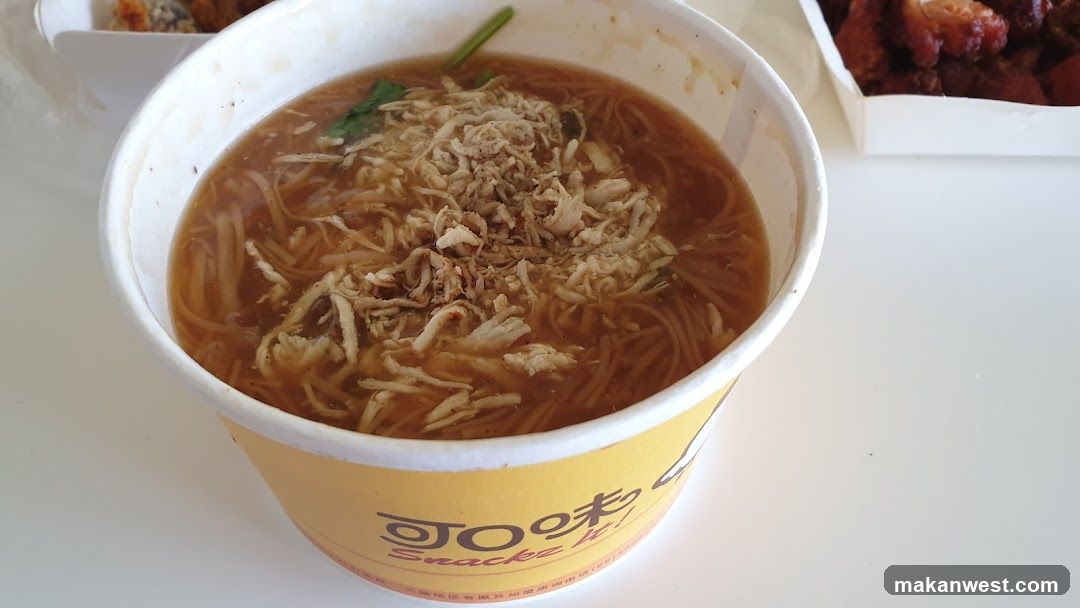 Bowl of noodles with shredded chicken