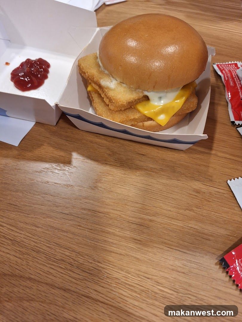 Burger with Fried Chicken and Cheese
