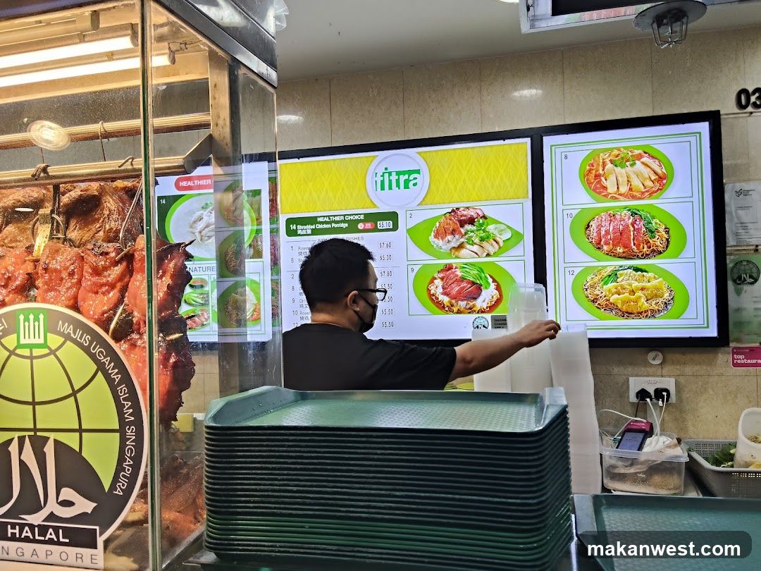 Food Stall Interior with Menu Board and Halal Signage