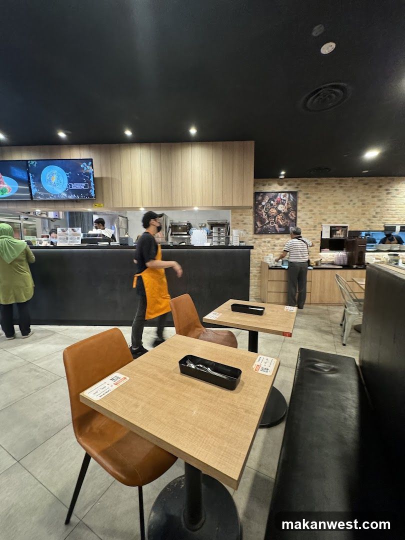 Restaurant Interior with Staff and Customers