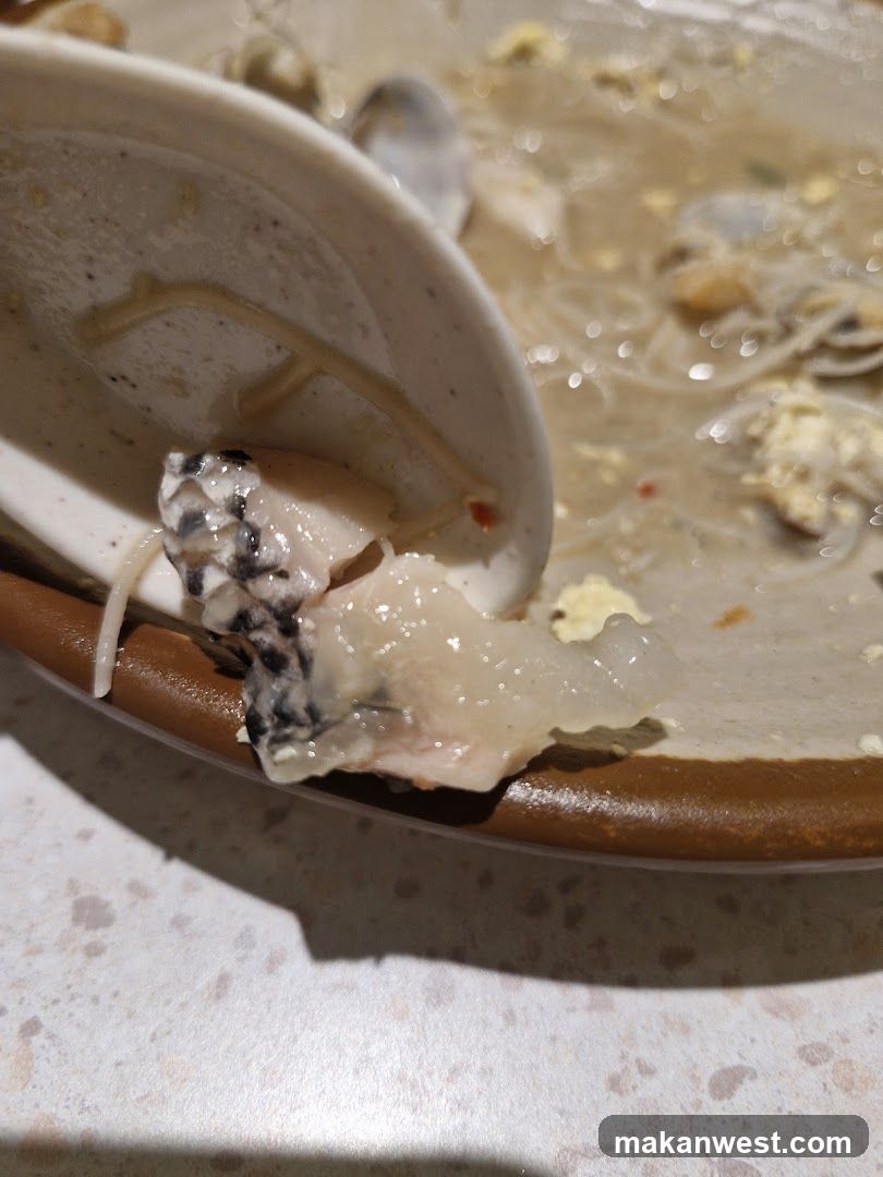 Bowl of Soup with Fish