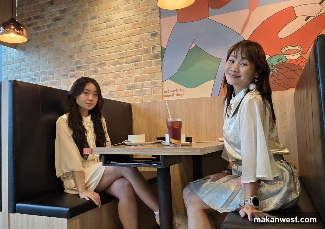 Two women in a cafe booth