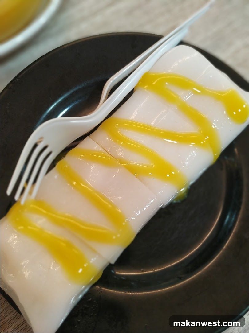 Dumpling with yellow sauce
