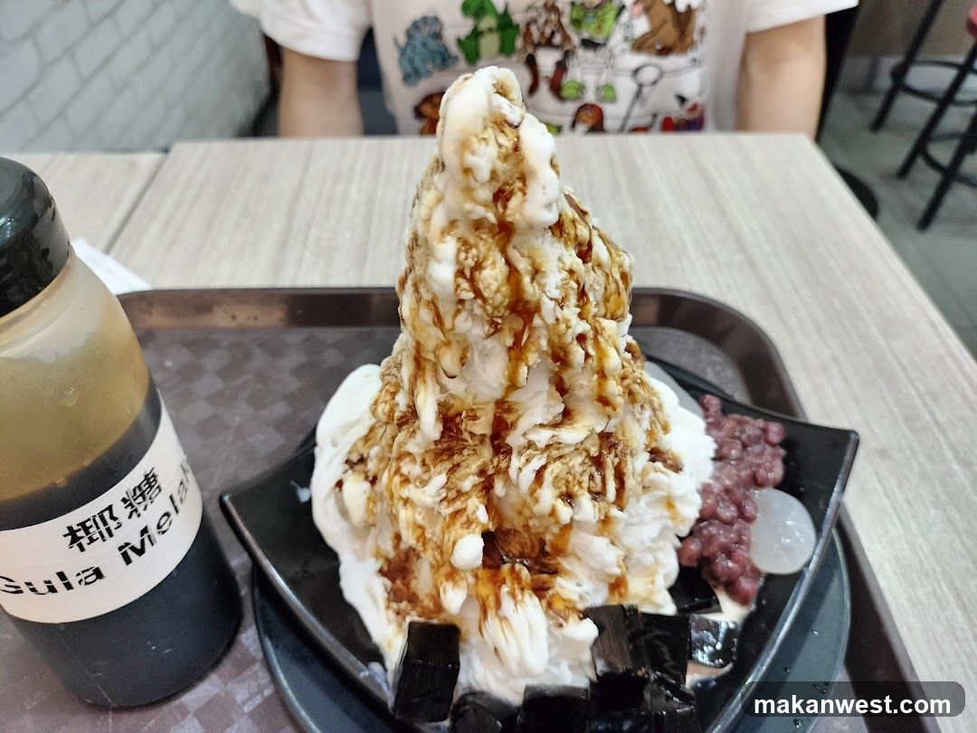 Shaved Ice Dessert with Syrup and Toppings
