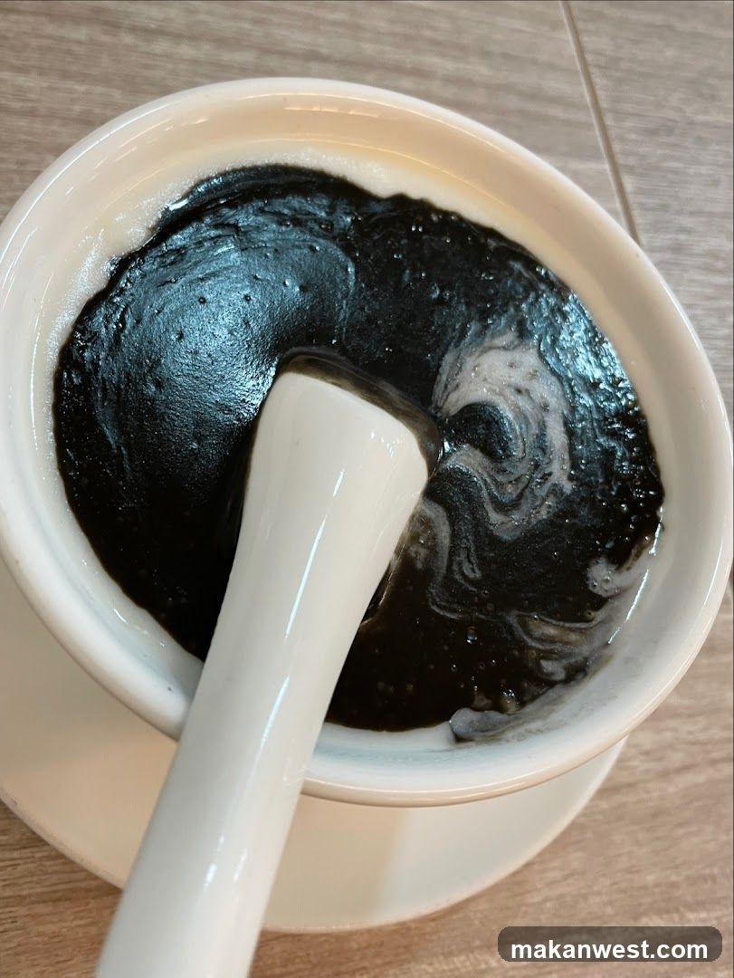 Black Porridge with Spoon