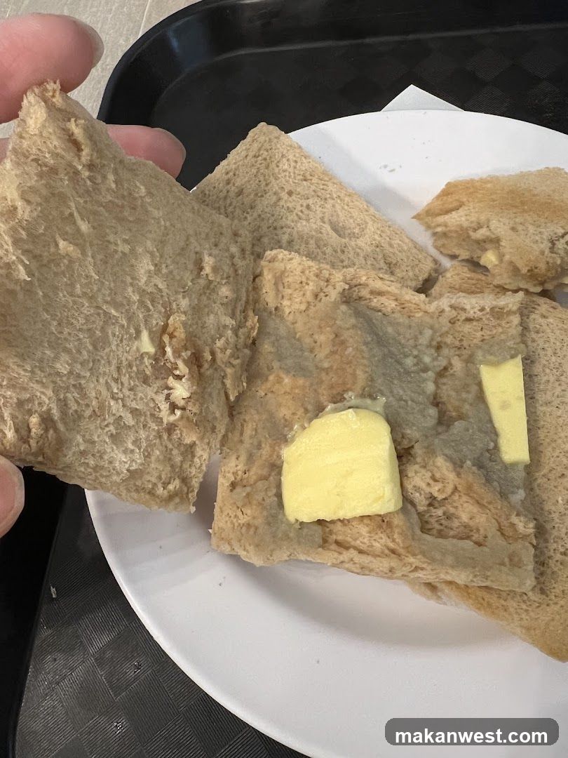 Buttered Bread on Plate